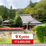 One-story house with a modern roof and large windows, featuring a driveway and parking space, listed for sale in Japan.